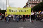 Pride is protest banner at Pride